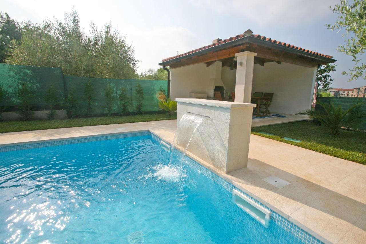 Apartments Maras โปเรช ภายนอก รูปภาพ